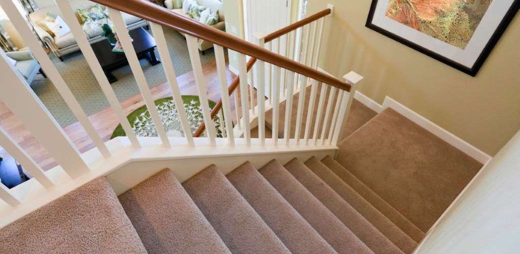 How do you paint around carpeted stairs