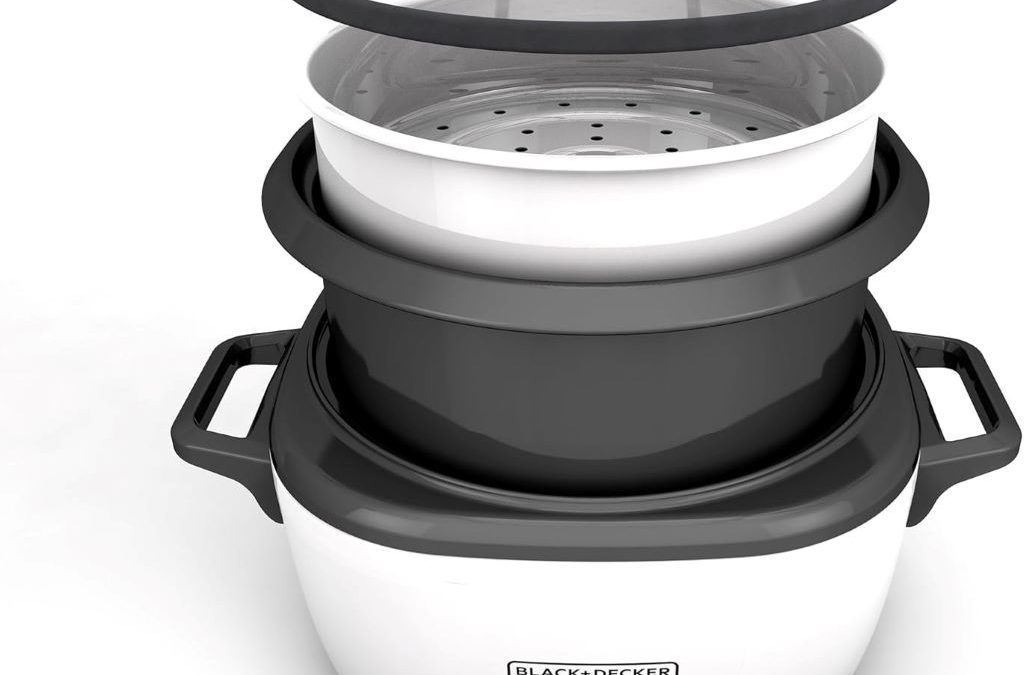 White BLACK+DECKER rice cooker with non-stick interior and steaming basket for easy meal prep.