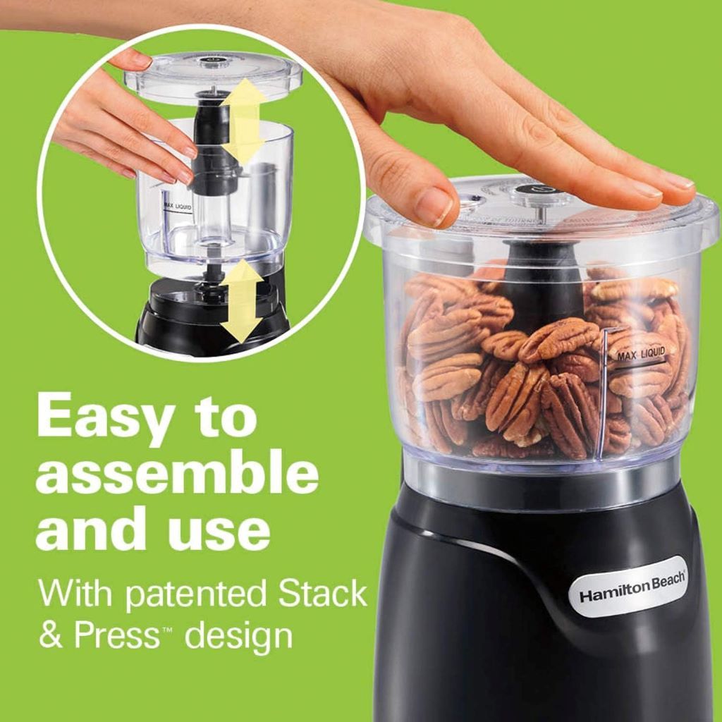 Hamilton Beach 3-Cup Electric Vegetable Chopper with stainless steel blades on a kitchen counter
