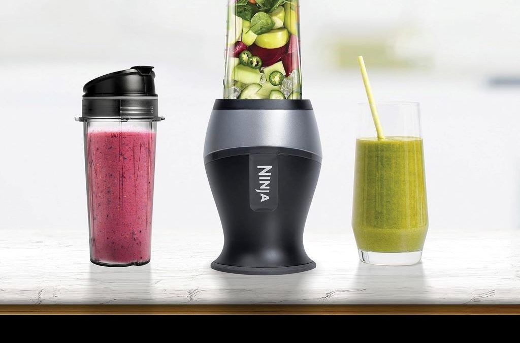 Ninja Fit Compact Personal Blender in black with two 16-oz cups, shown on a kitchen counter