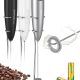 SIMPLETaste handheld milk frother with stainless steel whisk and stand on kitchen counter