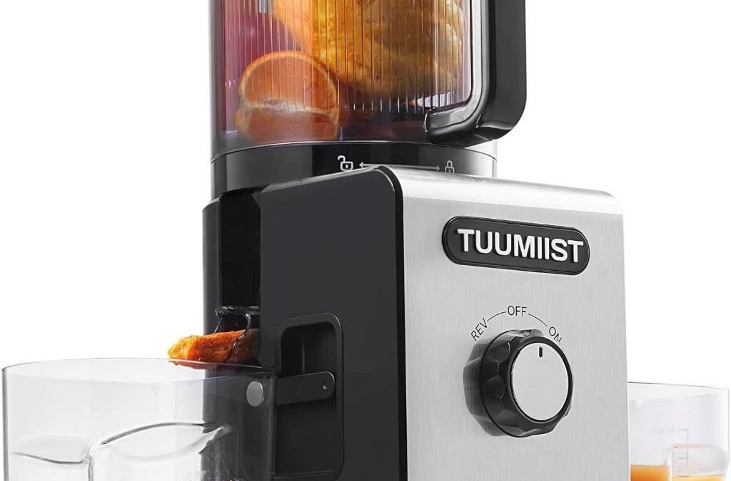 TUUMIIST Cold Press Juicer with large chute extracting fresh fruit and vegetable juice.