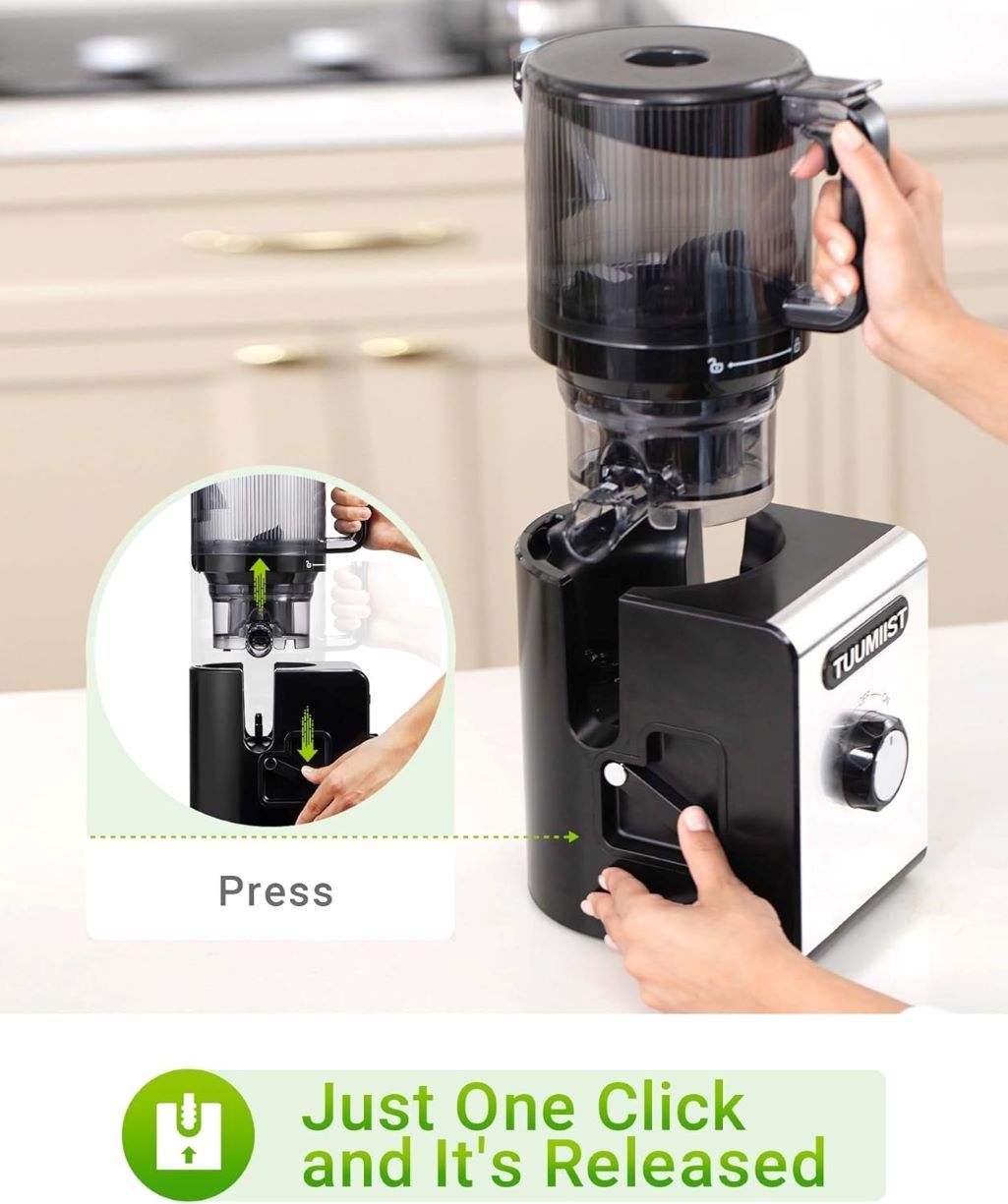 TUUMIIST juicer in action, pressing whole fruits and vegetables for fresh juice.
