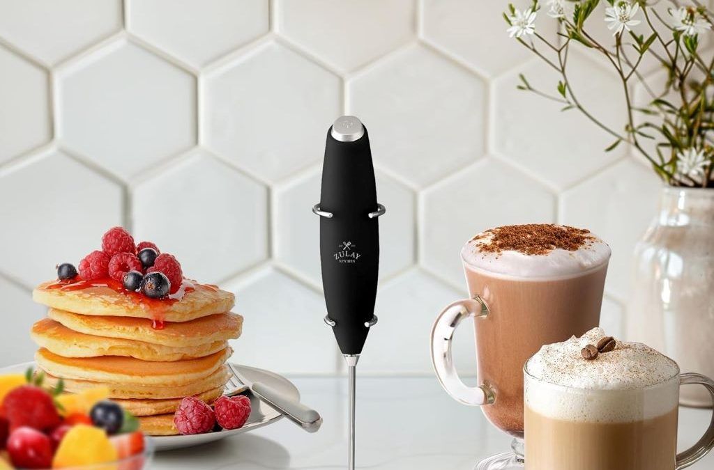 Black electric milk frother whisk for making creamy foam in seconds.