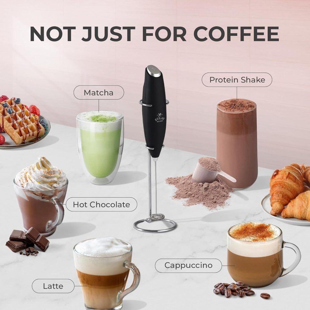 Zulay Kitchen handheld electric milk frother with stainless steel whisk, shown creating rich foam in a coffee mug.