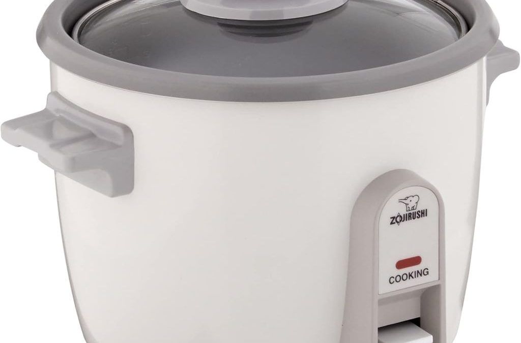 Zojirushi 3-Cup Rice Cooker and Steamer in white on a kitchen counter