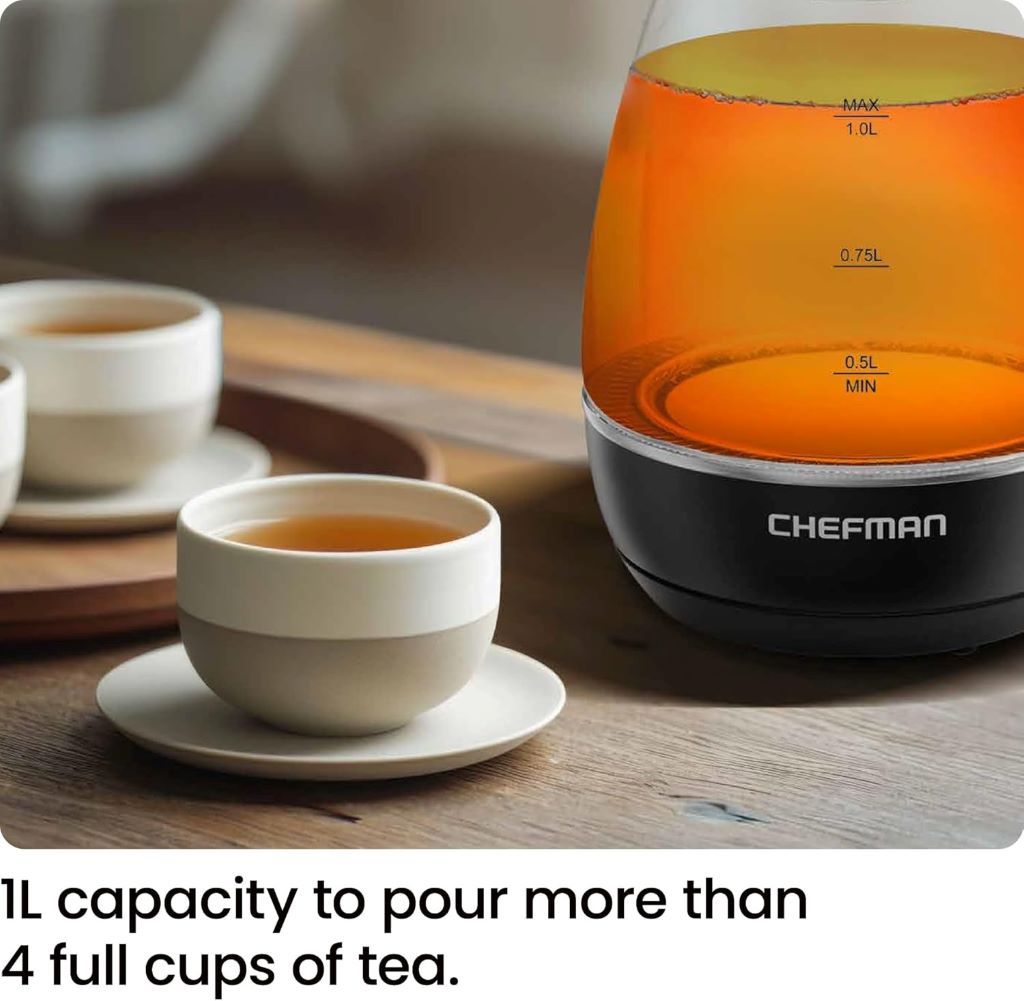 Compact Chefman electric kettle boiling water, featuring BPA-free design and auto shut-off
