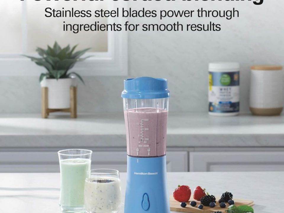 Hamilton Beach 14oz personal blender with travel lid in blue, perfect for smoothies and shakes.