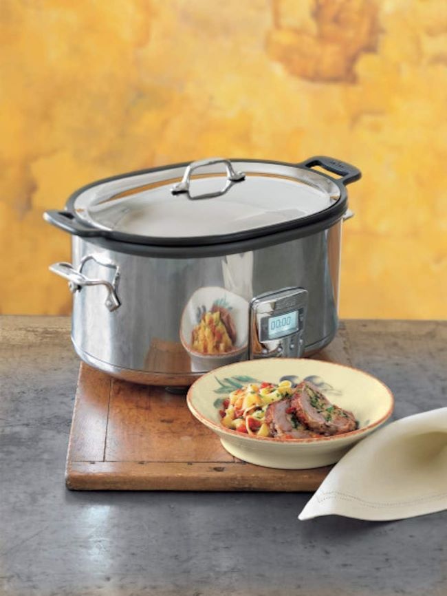 Programmable All-Clad 7-Quart slow cooker in silver, ideal for family meals and easy cooking.