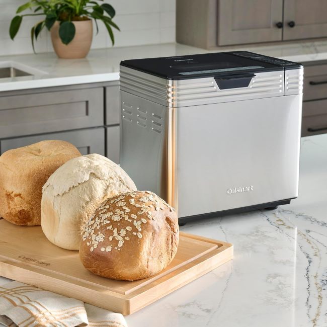 Cuisinart CBK-210 automatic bread machine showing stainless steel design and control panel