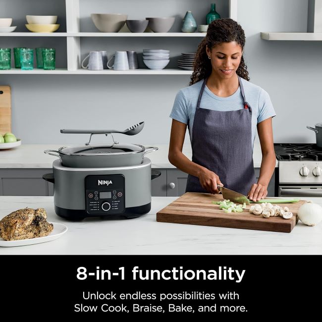 Versatile Ninja Foodi multi-cooker showing nonstick pot and integrated spoon in modern Sea Salt Gray.