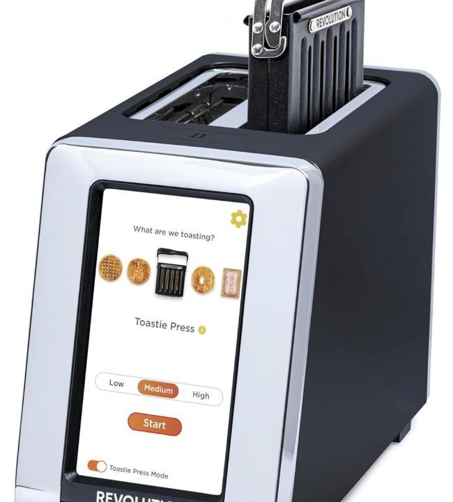 Revolution R180 smart toaster and toastie press with touchscreen controls on a kitchen counter