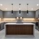 Under-cabinet lighting installation illuminating a modern kitchen workspace