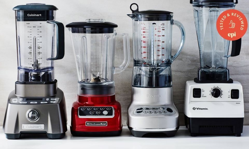 Modern blender with glass jar preparing ingredients for daily cooking.