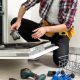 Maintaining household appliances with regular cleaning and care to prevent costly repairs