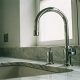 Modern kitchen sink with stylish faucet installed in a contemporary home kitchen