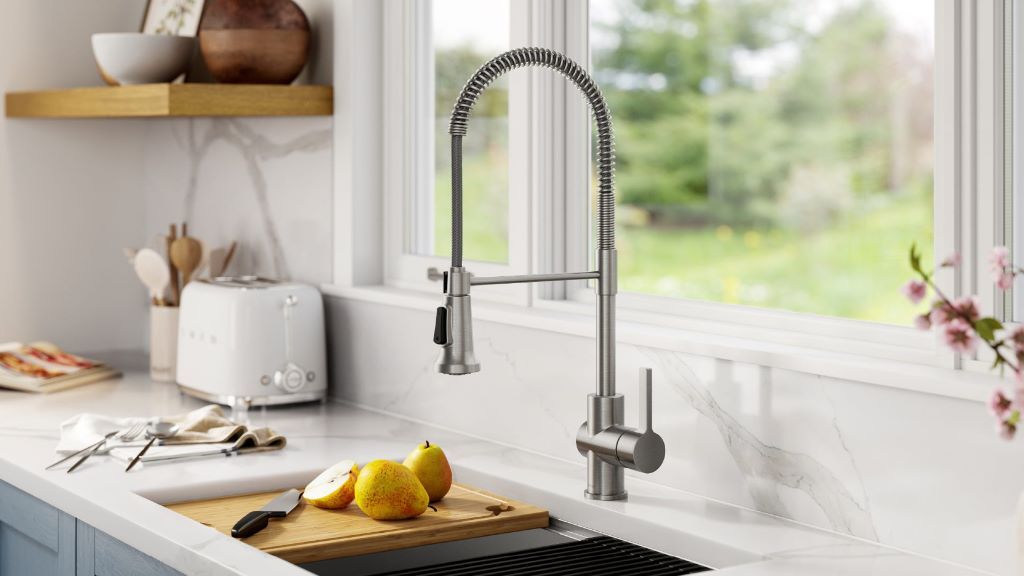 Close-up of sleek chrome kitchen faucet designed for modern home use and easy water control