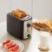 Amazon Basics 2 Slice Toaster featuring adjustable browning settings and removable crumb tray
