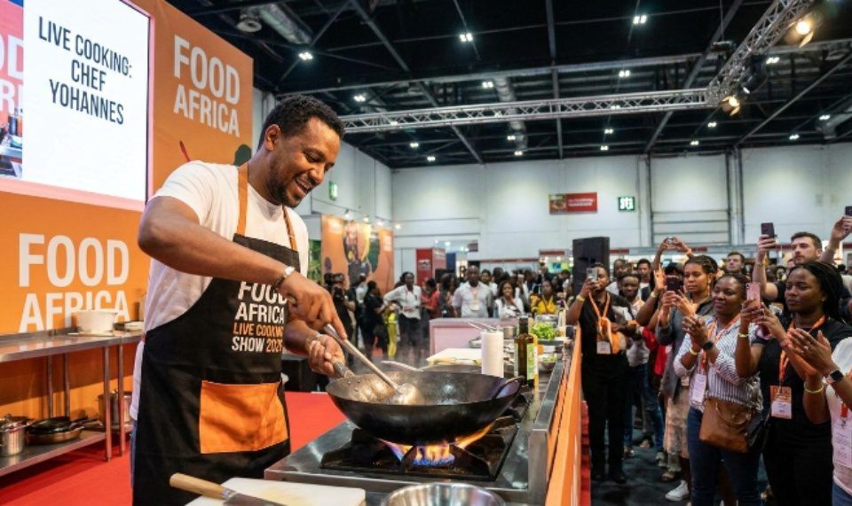 Celebrity chef cooking live on stage at Food Africa Live Cooking Show 2026