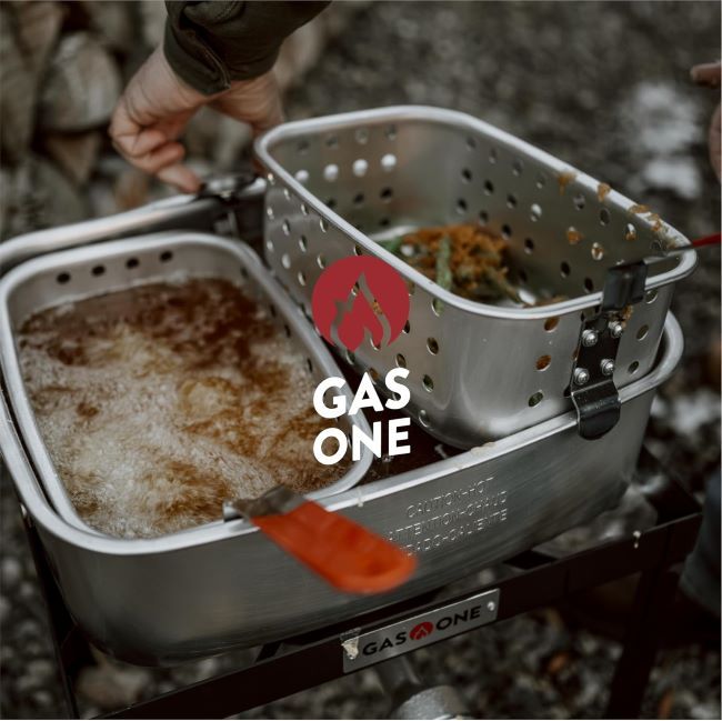 Gas One propane fryer set preparing turkey, seafood, and fish with consistent heat