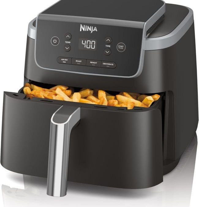 Ninja Air Fryer preparing crispy fries and chicken on a Tennessee kitchen countertop