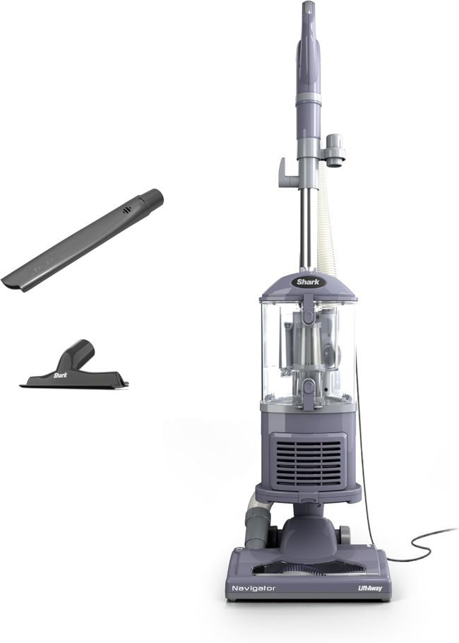 Shark Navigator Lift-Away vacuum cleaning pet hair from carpet in a New York home