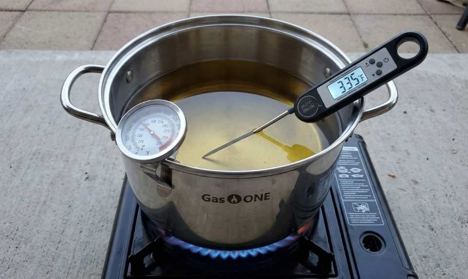 Gas One propane fryer thermometer showing oil temperature