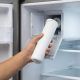 Installing a GE XWFE refrigerator water filter inside refrigerator compartment