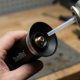 Sondiko butane torch being safely refilled with butane