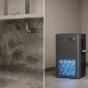ToLife dehumidifier operating in a damp bedroom